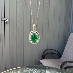 Emerald halo necklace
